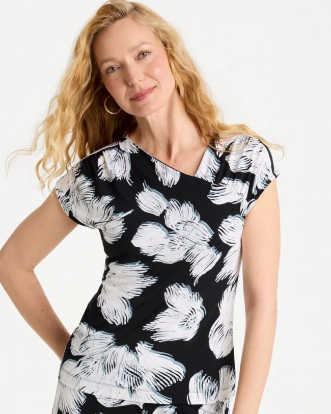 Chicos Travelers™ Knit Abstract Floral Asymmetrical Top - BLACK